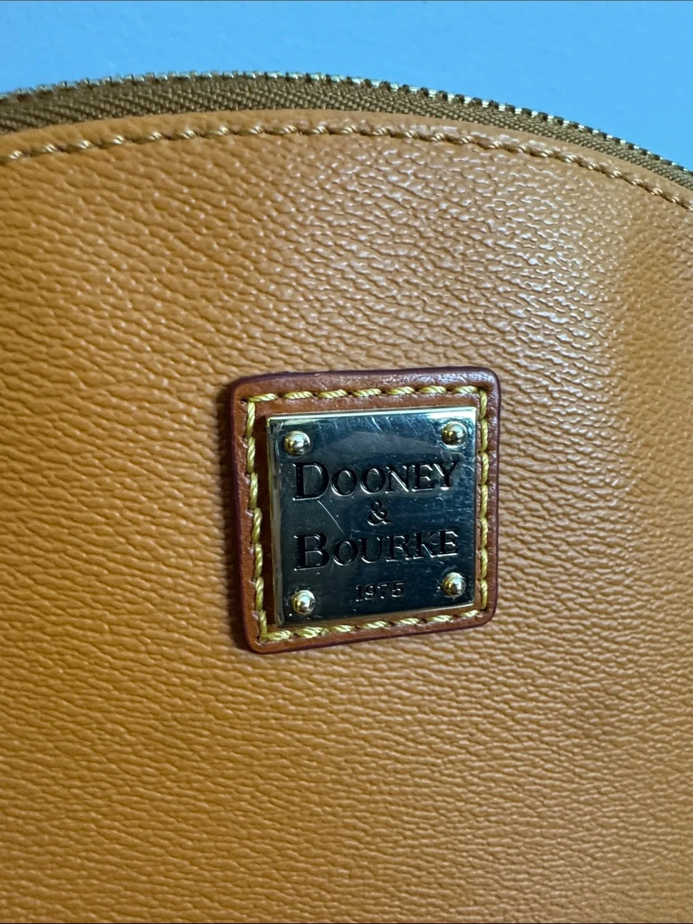 Dooney & Bourke Pebbled Leather Crossbody with Tassel Zip